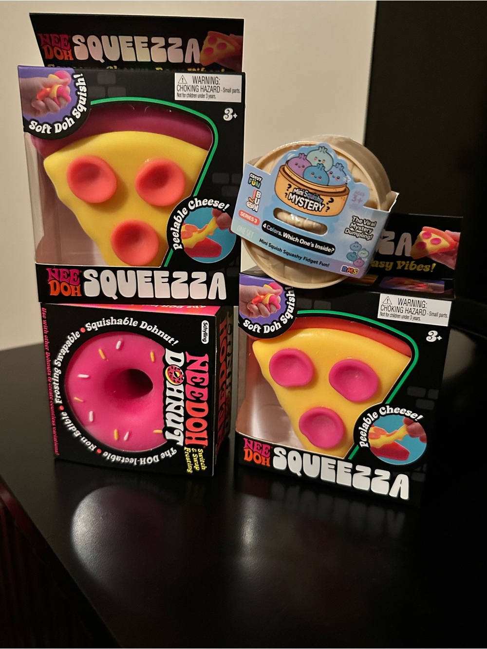 NeeDoh Squeeza Pizza & Donut and mini dumpling - Yellow & Pink (lot of 4)
